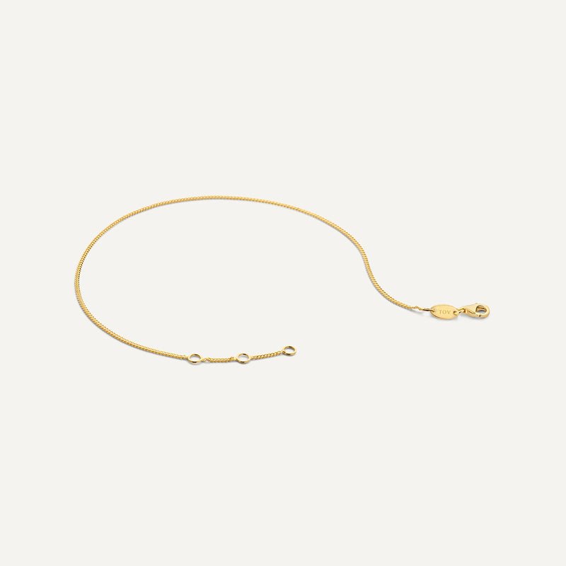 Baby Curb Schakelarmband - 14 karaat goud