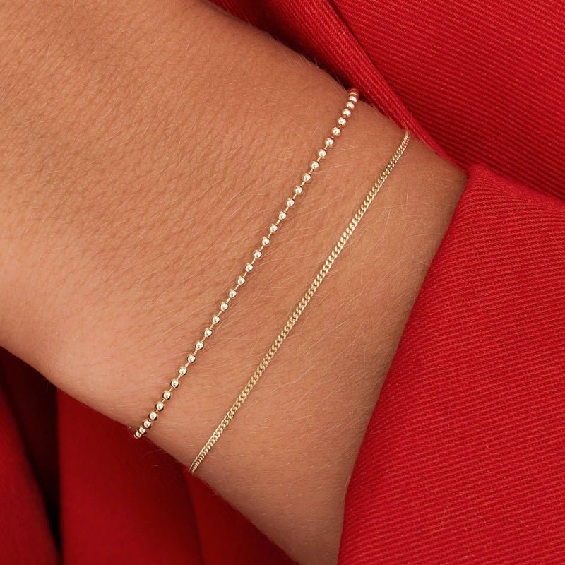 Baby Curb Schakelarmband - 14 karaat goud