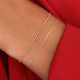Baby Curb Schakelarmband - 14 karaat goud