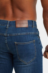 Tailored Athlete stretch jeans donker blauw - maat W34 x L30